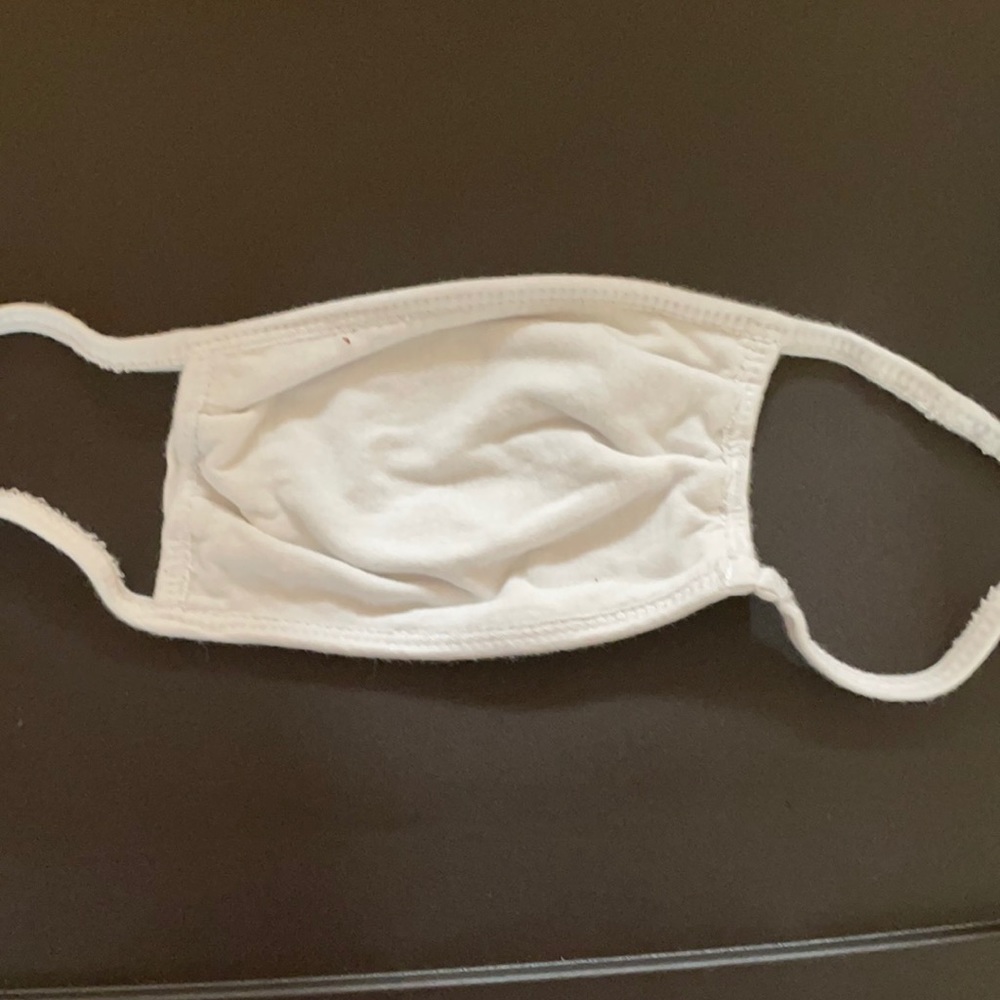 Never worn white face mask